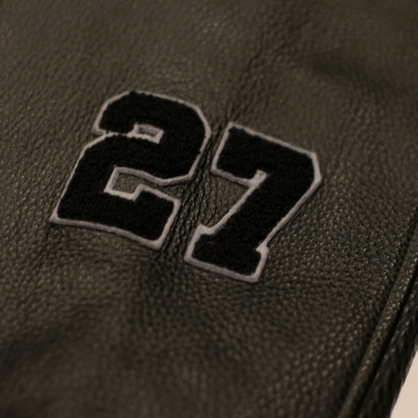 NUMBERED stadium jumper